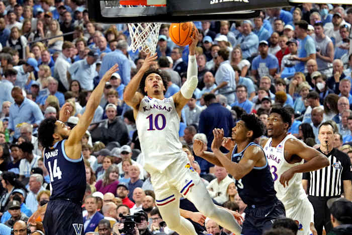Apr 2, 2022; New Orleans, LA, USA; Kansas Jayhawks forward Jalen Wilson (10) shoots the ball against Villanova Wildcats guard Caleb Daniels (14) during the second half in the 2022 NCAA men's basketball tournament Final Four semifinals at Caesars Superdome. Mandatory Credit: Robert Deutsch-USA TODAY Sports